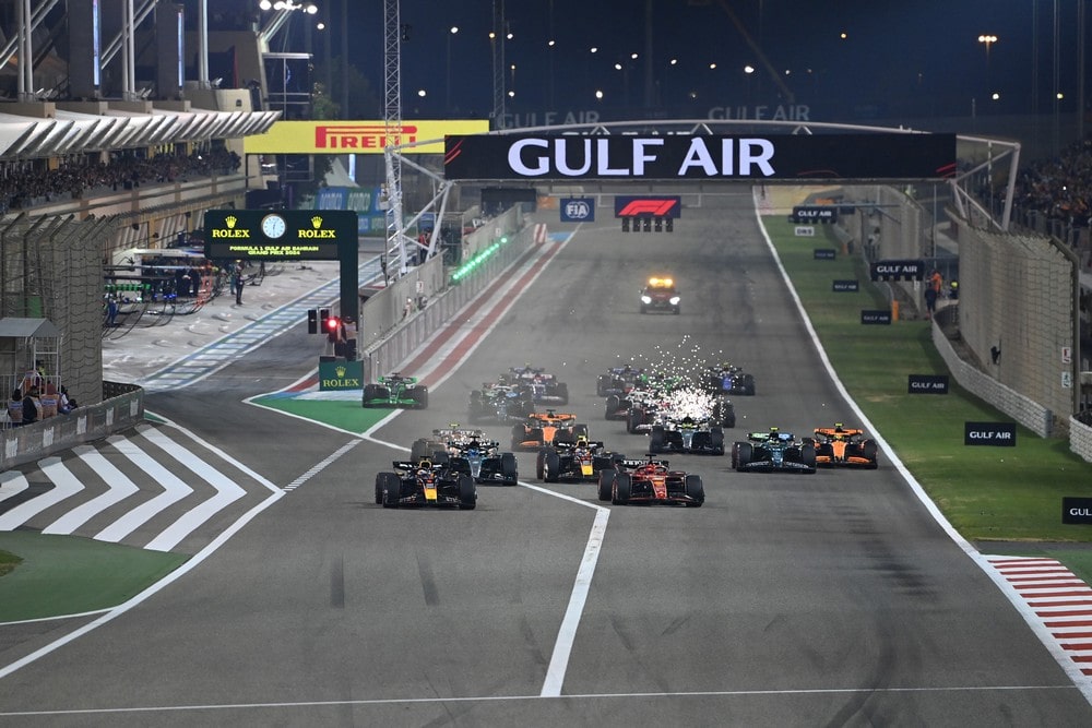 All cars racing towards the first corner at the start of the 2024 Bahrain Grand Prix