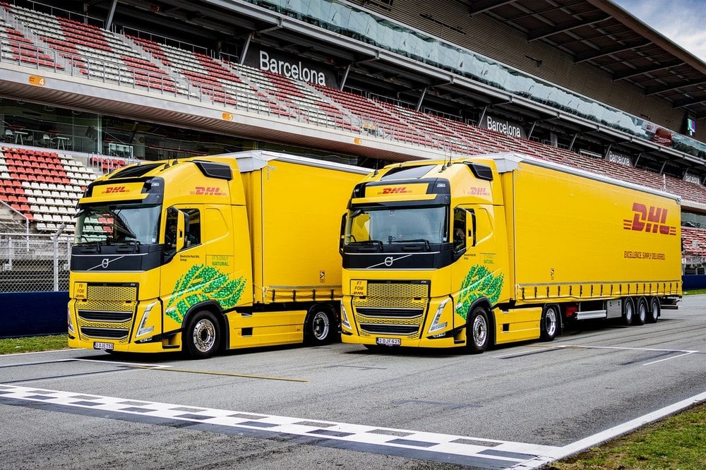 Two DHL branded trucks at the start-finish line of the Circuit de Barcelona-Catalunya