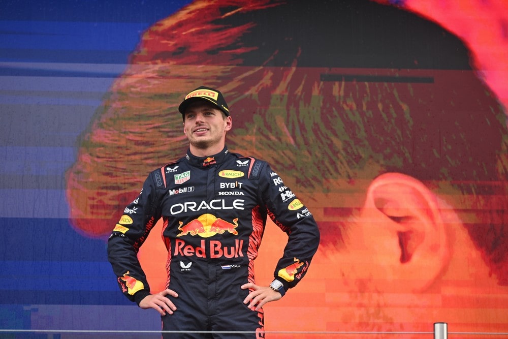 Max Verstappen standing in front of a TV screen at the 2023 Dutch Grand Prix