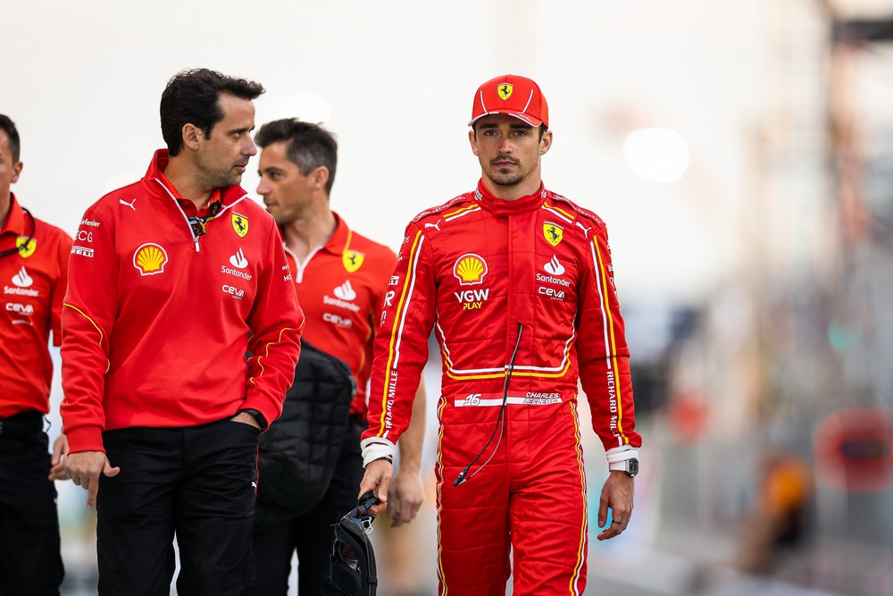 Race engineer Xavi Marcos (left) walking alongside Charles Leclerc (right) at the 2024 Bahrain Grand Prix