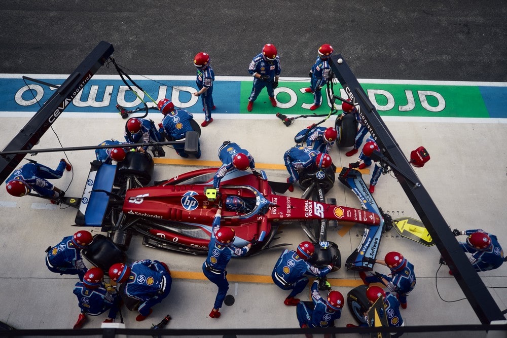 Overhead view of Carlos Sainz's pitstop in a special 2024 Miami Grand Prix Ferrari livery