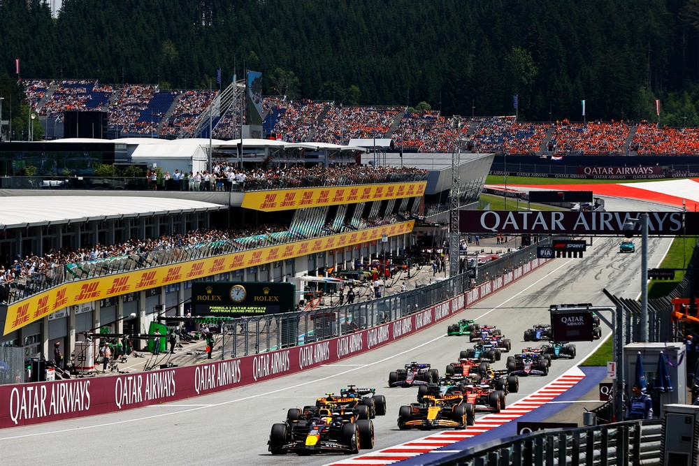 Max Verstappen leads the entire field into the first corner at the start of the 2024 Austrian Grand Prix Sprint Race