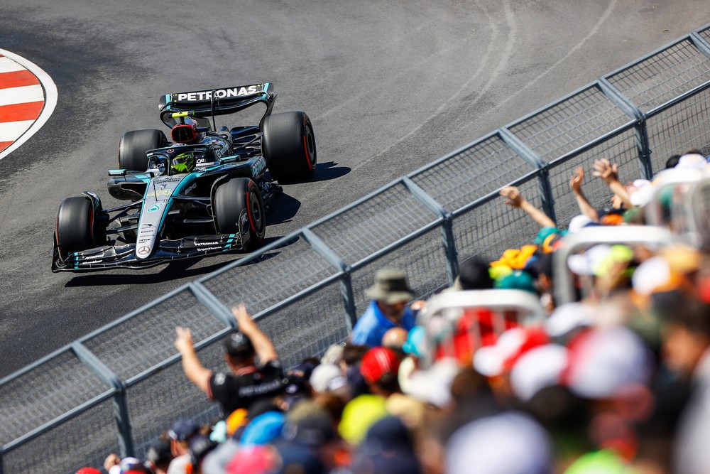 Lewis Hamilton races past fans at the hairpin during practice for the 2024 Canadian Grand Prix