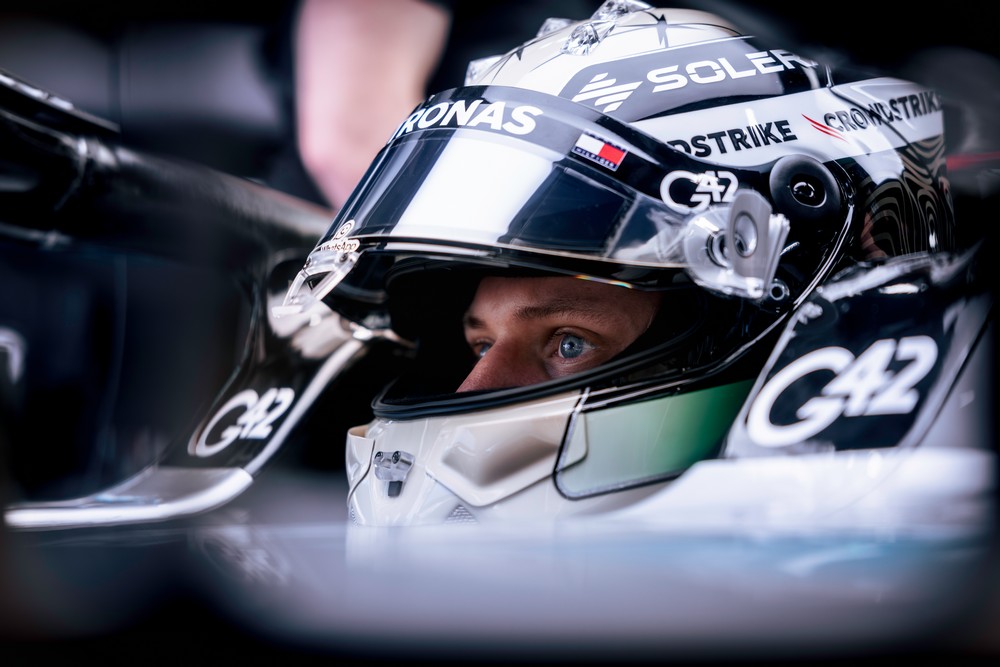 Close-up of Mick Schumacher sitting inside a Mercedes Formula One car