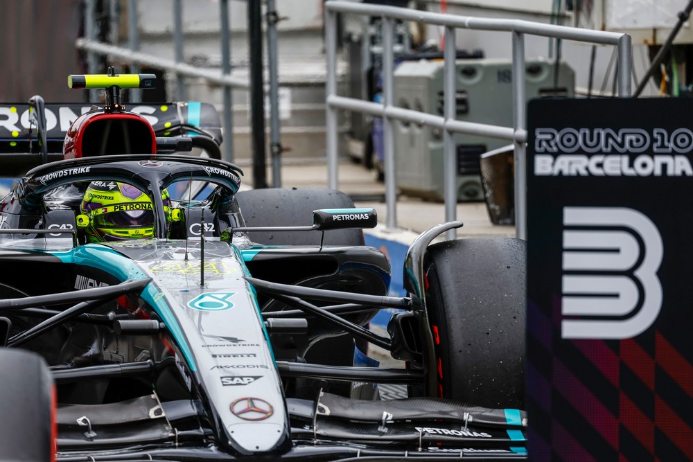 Lewis Hamilton parks his Mercedes behind a P3 sign after qualifying for the 2024 Spanish Grand Prix