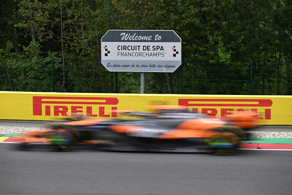 Oscar Piastri's McLaren blurs past a 