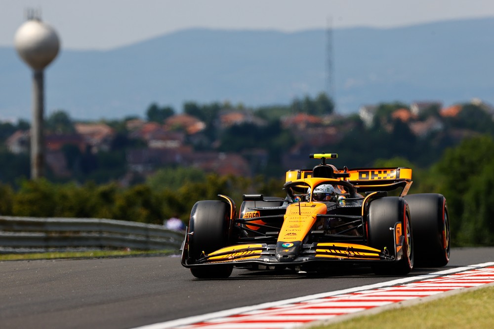 Lando Norris during practice for the 2024 Hungarian Grand Prix with scenery in the background