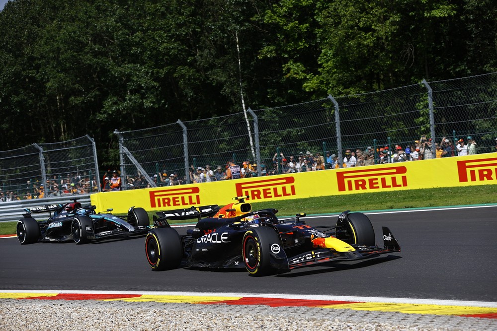 Sergio Perez leads George Russell during the 2024 Belgian Grand Prix