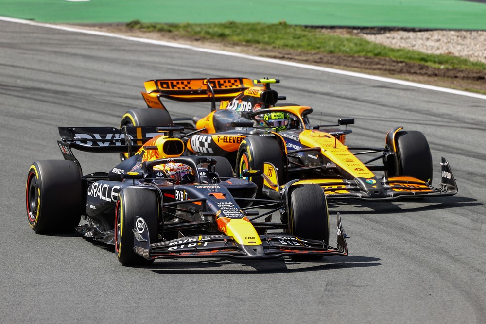 Max Verstappen racing on the inside of Lando Norris at the 2024 Dutch Grand Prix