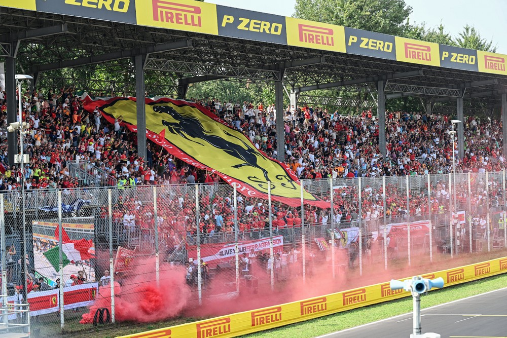 Ferrari fans hold a Ferrari banner in the grand stands at the 2024 Italian Grand Prix