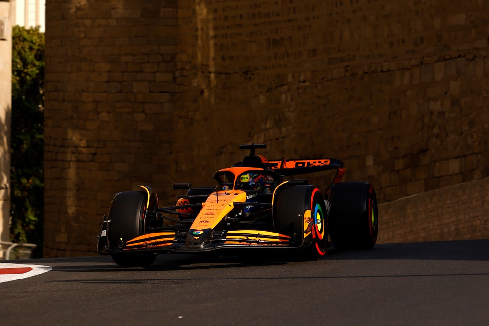 Oscar Piastri during qualifying for the 2024 Azerbaijan Grand Prix with the historic castle walls in the background