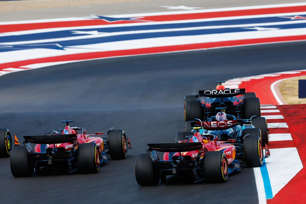 Max Verstappen leads the field into the first corner at the 2024 United States Grand Prix sprint race