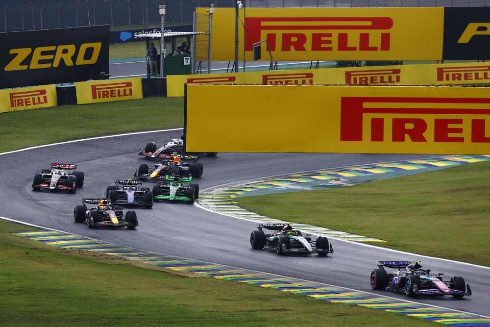 The field navigates a wet Interlagos Circuit during the 2024 Brazilian Grand Prix