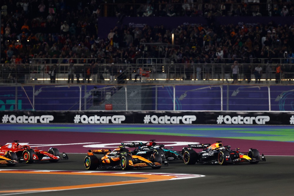 Lead cars battle into the first corner of the 2024 Qatar Grand Prix