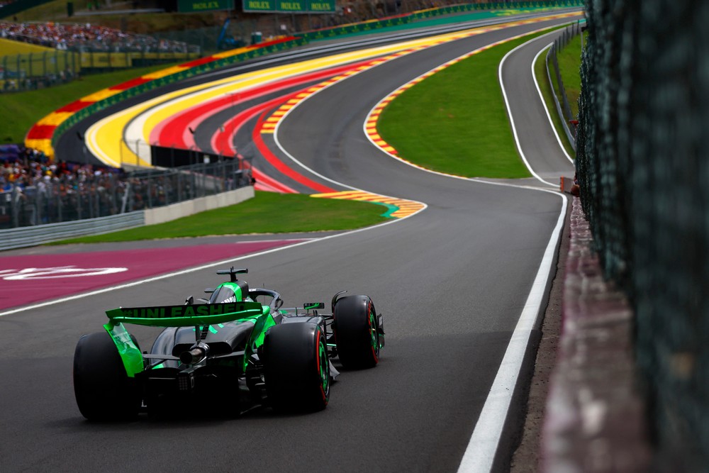 Rear view of Valtteri Bottas' car as it prepares to race up the iconic Raidillon section of the Circuit de Spa-Francorchamps at the 2024 Belgian Grand Prix