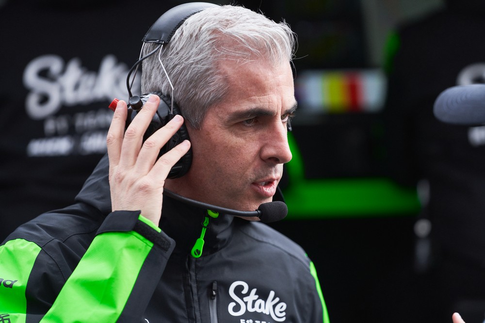 Sauber team principal Alessandro Alunni Bravi talking into a headset during the team's 2024 pre-season filming day