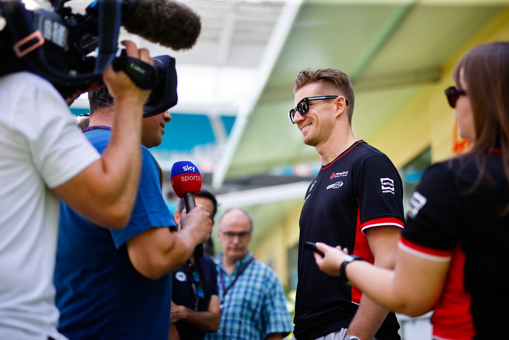 Nico Hulkenberg speaking with Sky Sports journalist Ted Kravitz and a TV crew