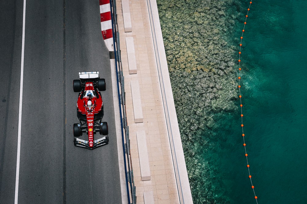 Overhead view of Charles Leclerc racing alongside the Monaco habour during practice for the 2025 Monaco Grand Prix