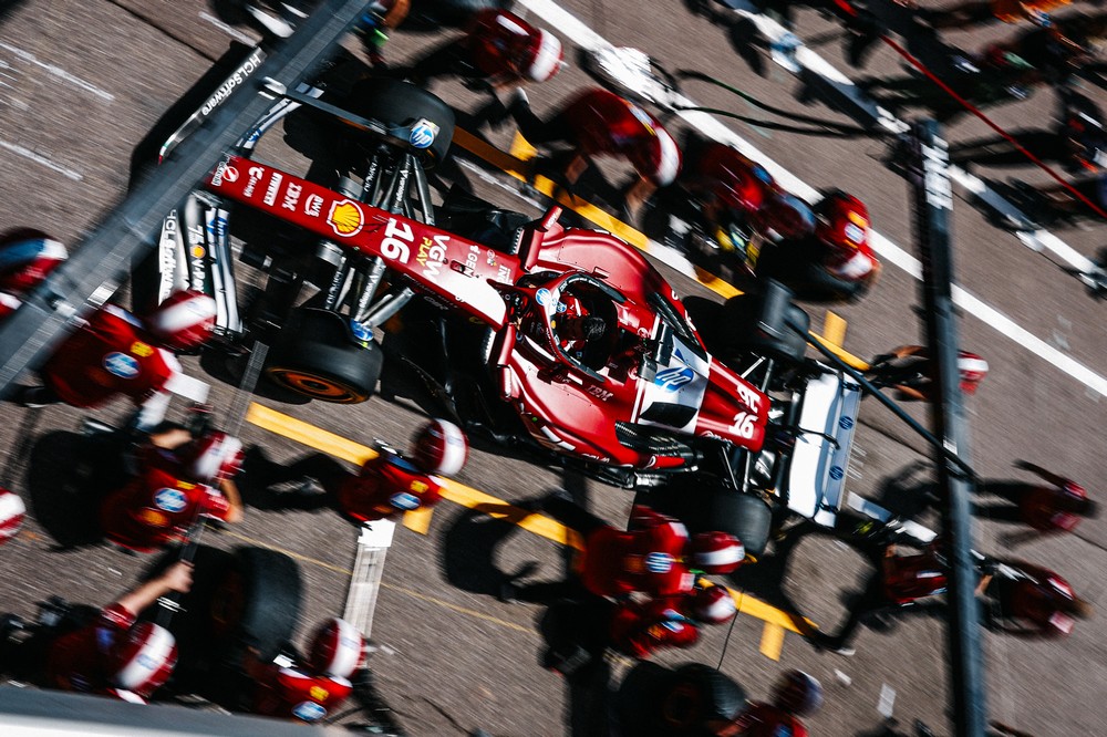 Charles Leclerc exits the Ferrari pit box after changing tyres at the 2025 Monaco Grand Prix