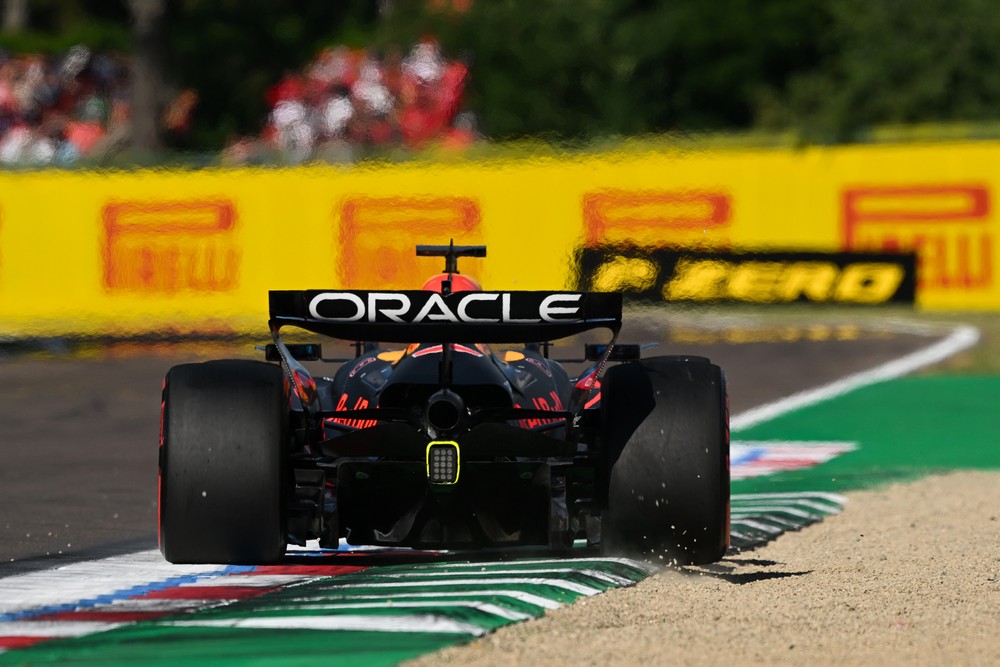 Max Verstappen dips a tyre in the gravel during qualifying for the 2025 Emilia-Romagna Grand Prix