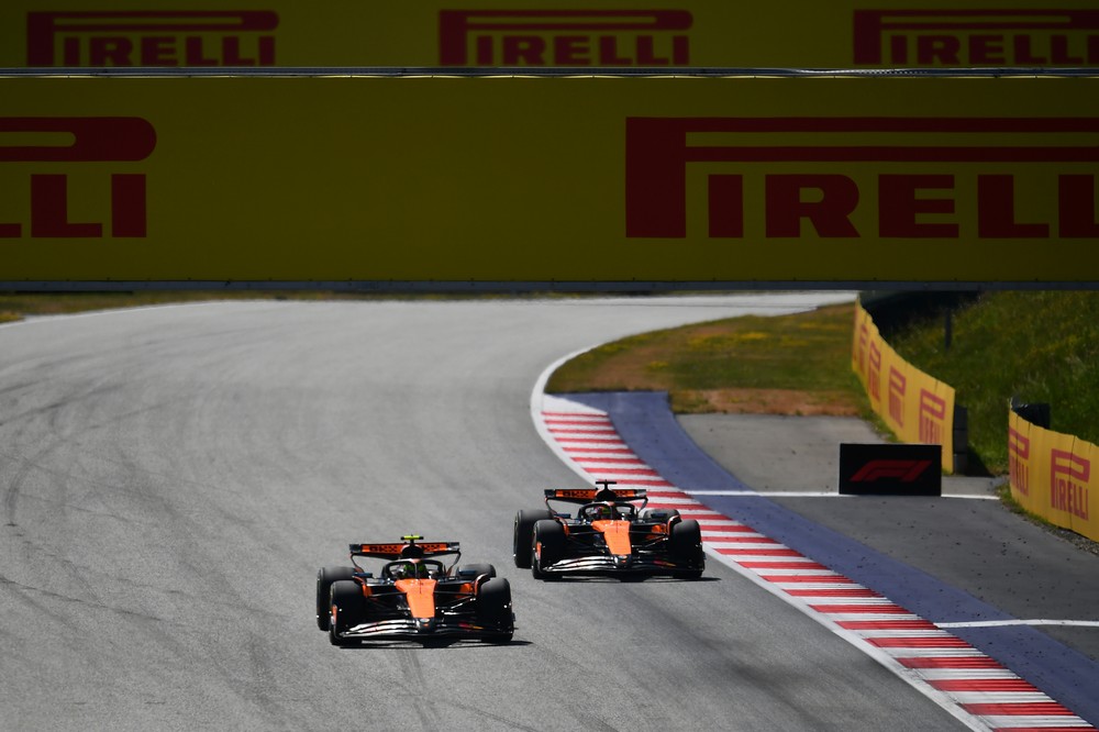 Lando Norris and Oscar Piastri battle for the lead of the 2025 Austrian Grand Prix