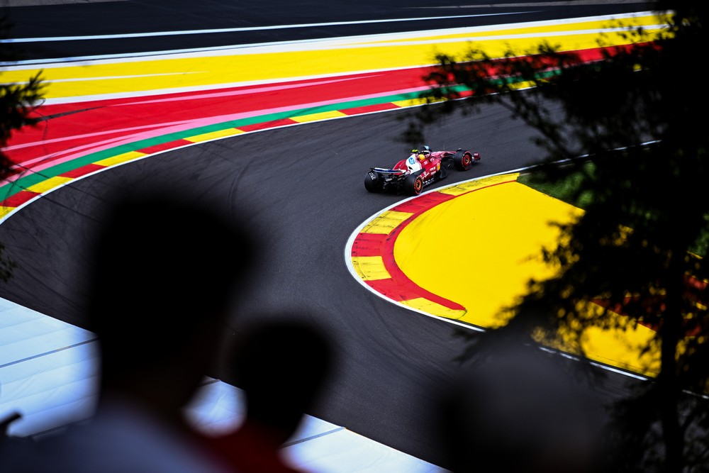 The view from the grandstands as Lewis Hamilton rounds a corner during practice for the 2025 Belgian Grand Prix