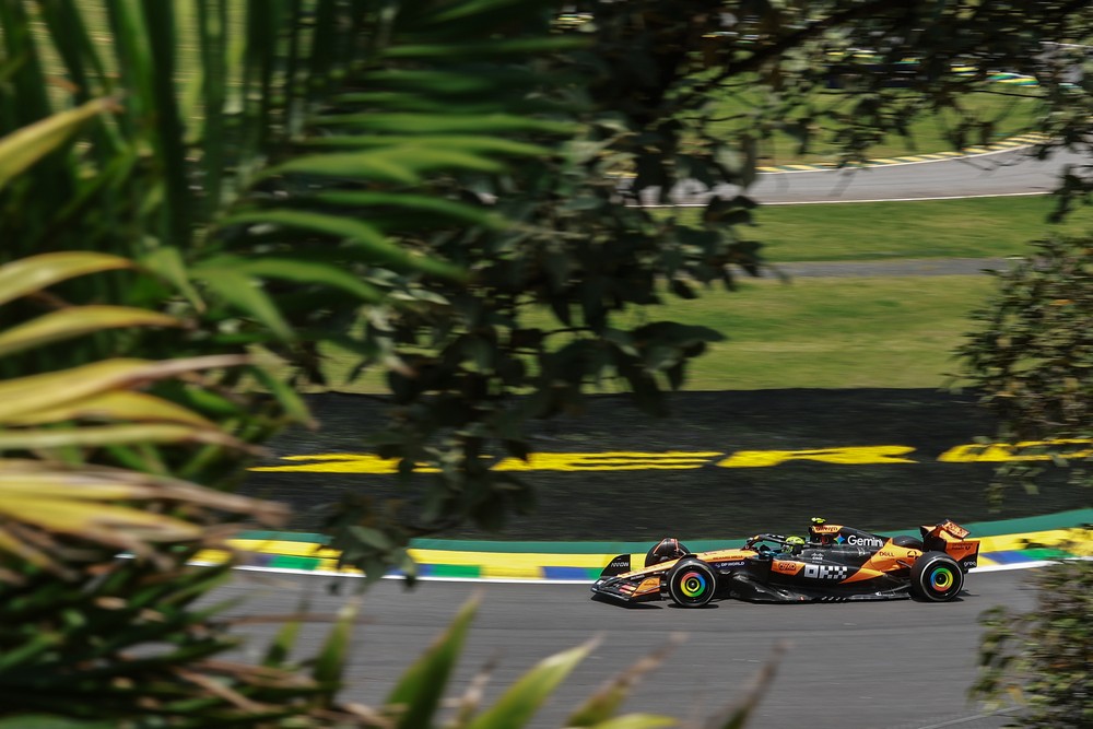 Lando Norris through the trees during practice for the 2025 Brazilian Grand Prix